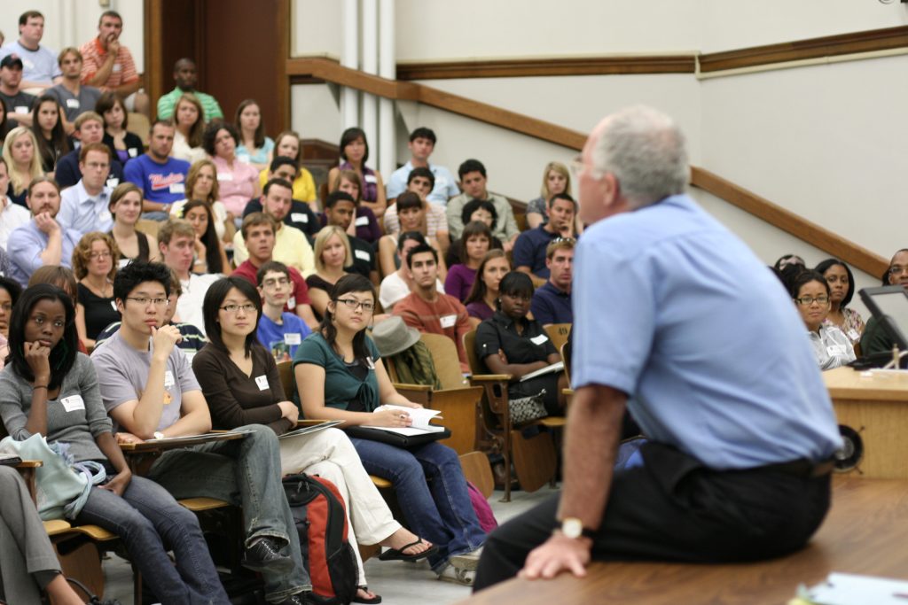 Professor at first-year students orientation.