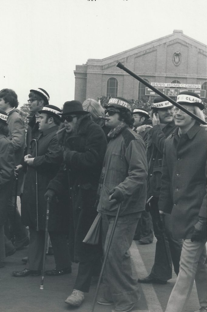 Students wait to run across the field at Camp Randall.