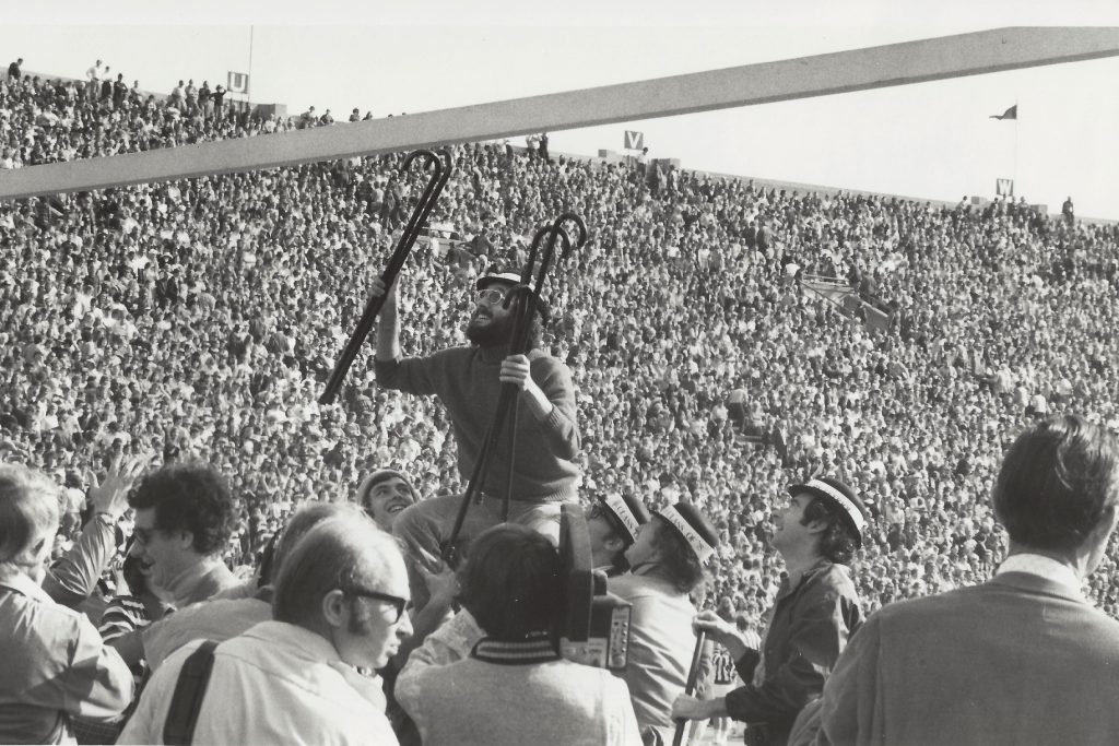 Students participating in cane toss