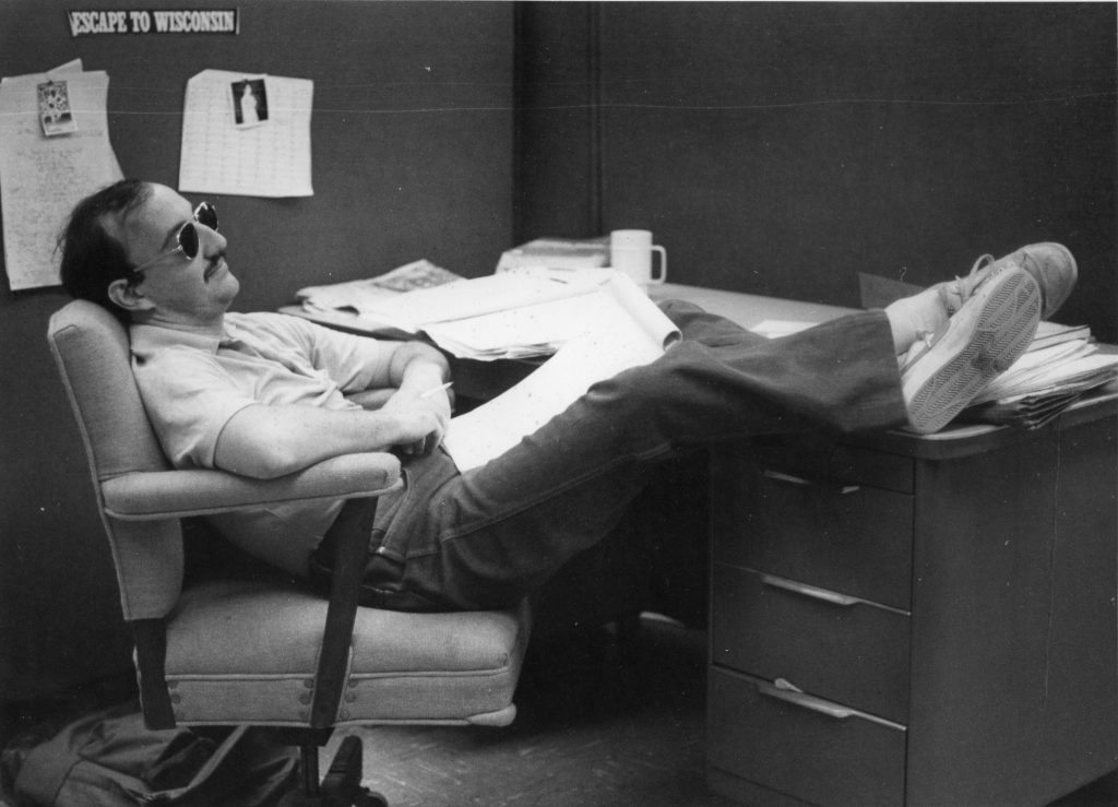 person in chair with feet up