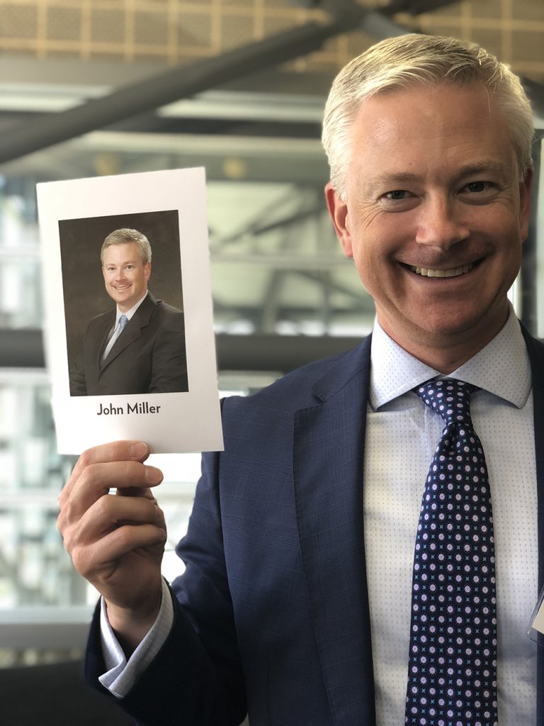 John Miller '06 holds his class exit photo