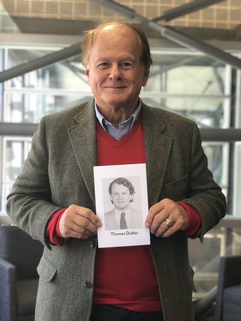 Tom Dubbs '74 holds his class exit photo