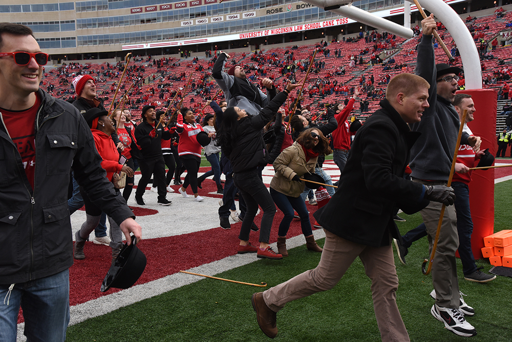 students at the endzone of the cane toss