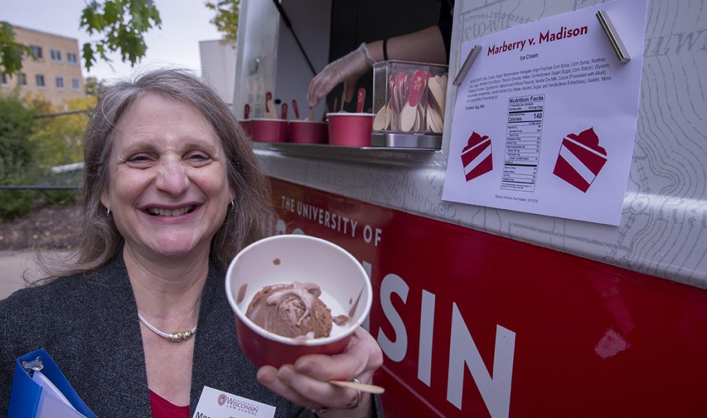 Dean Margaret Raymond with cup of ice cream