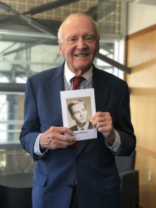 Jay Holmes '67 holds his class exit photo