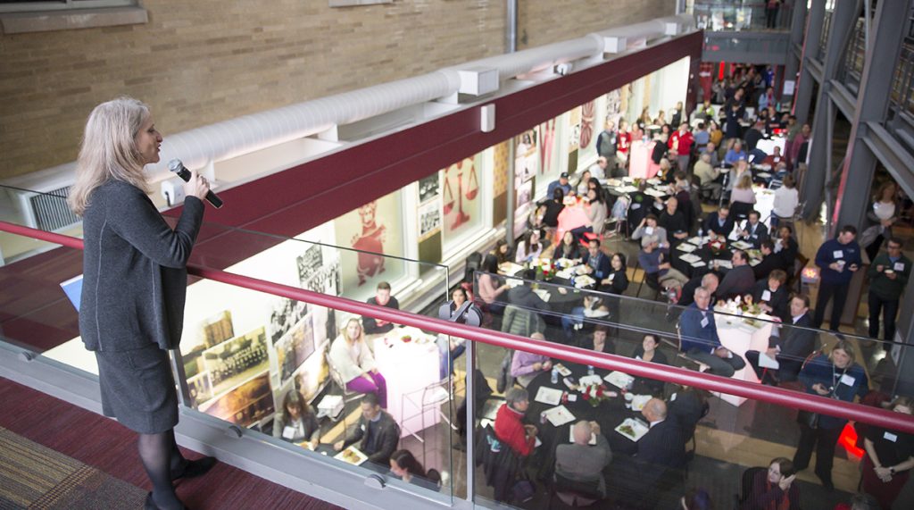 Dean Raymond addressing UW Law guests in the atrium